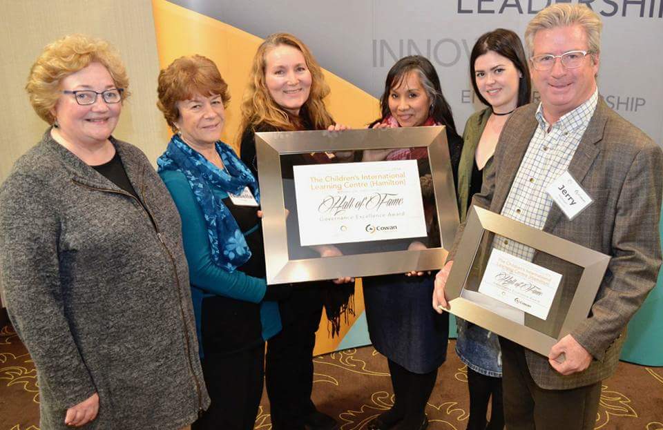 group photo with award